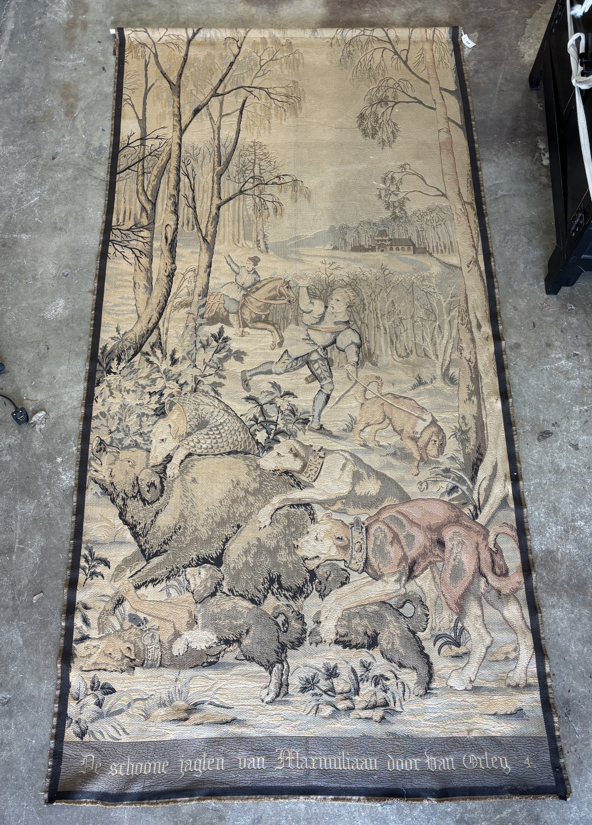 A German machine tapestry of a hunting scene, 300cm high